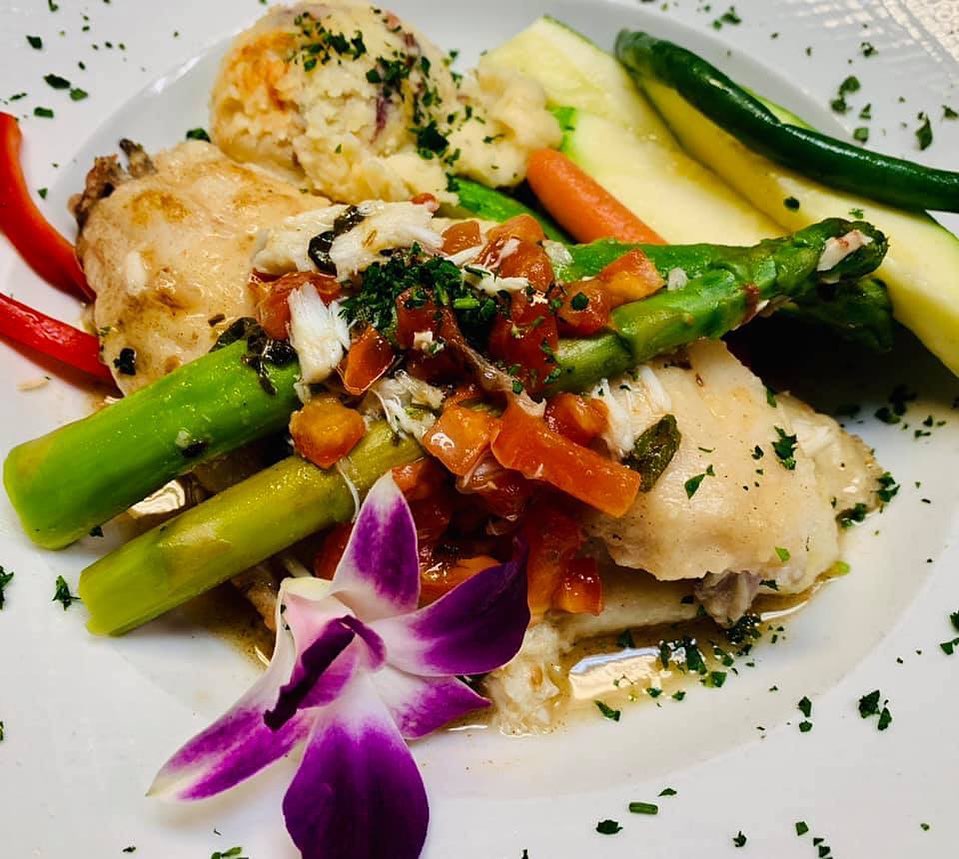 Pan Seared Grouper topped with Blue Crab Gratzzi Italian Grille